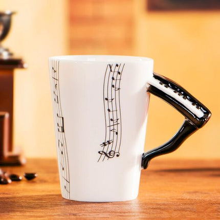 Coffee cup with music notes in the form of saxophone handle ceramic porcelain cup of tea milk method